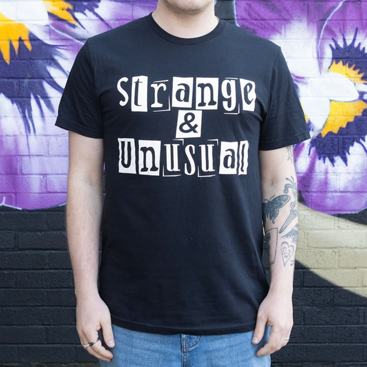 Strange & Unusual Unisex T-shirt Size S