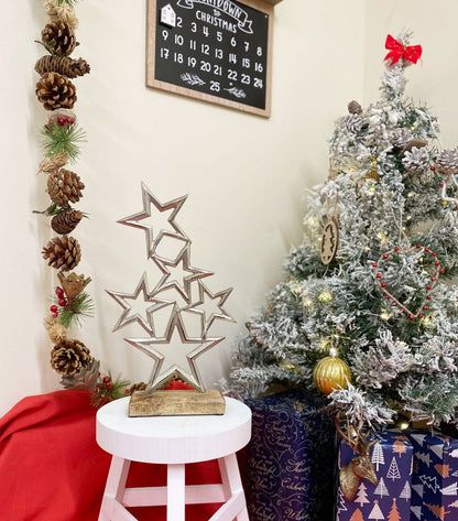 Silver Metal Stars On Wood Plinth